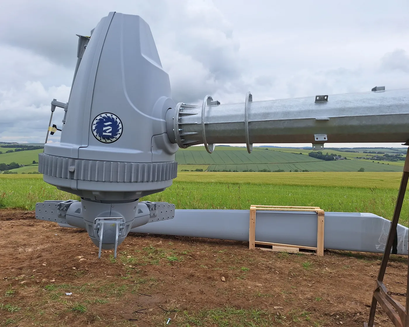 The KW30 nacelle, with the Kodair roundel, on its tower before raising