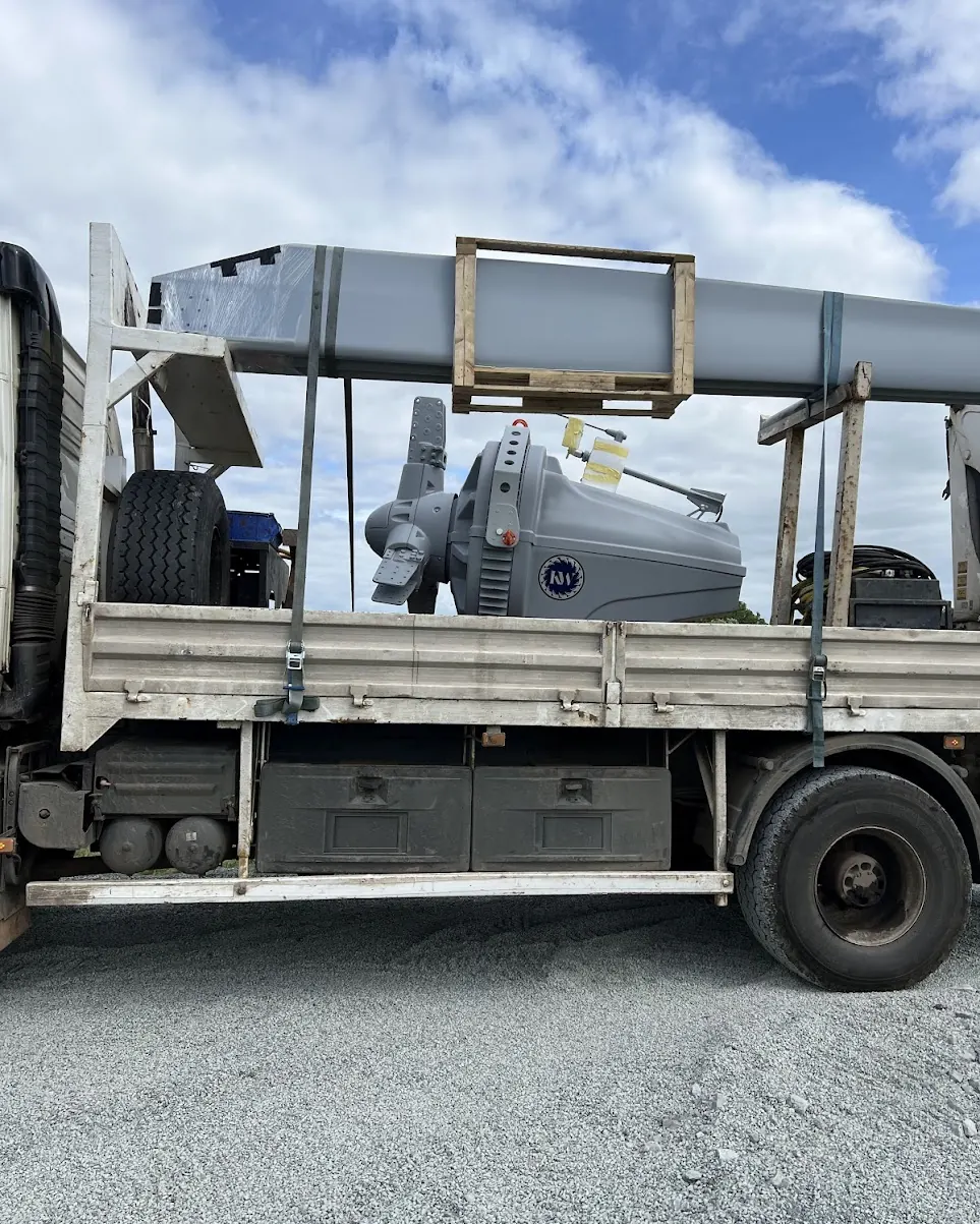 The Kodair nacelle and tower arriving at the property on a crane lorry