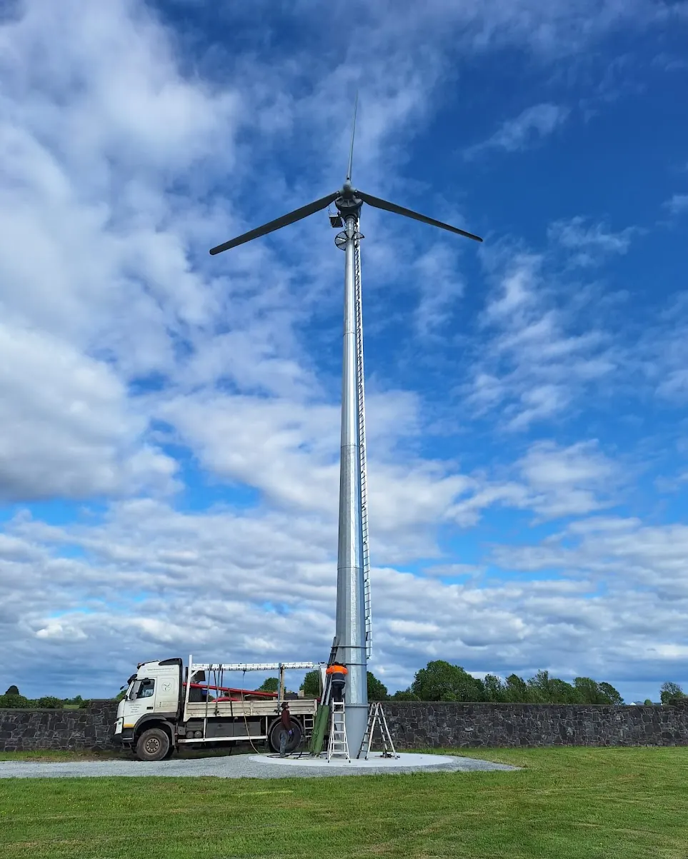 The finished Kodair turbine at the residence, with the installation lorry below