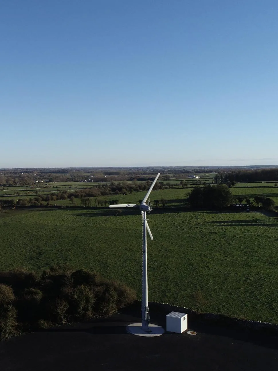 Drone view of a Kodair turbine in open farmland