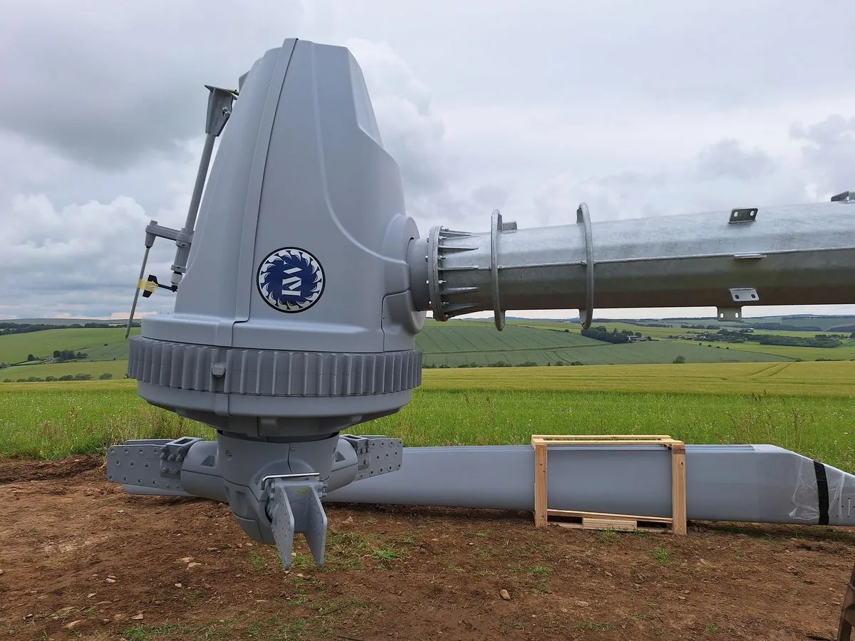 A Kodair nacelle fitted to the top of the tower at ground level, before the tower is tilted up